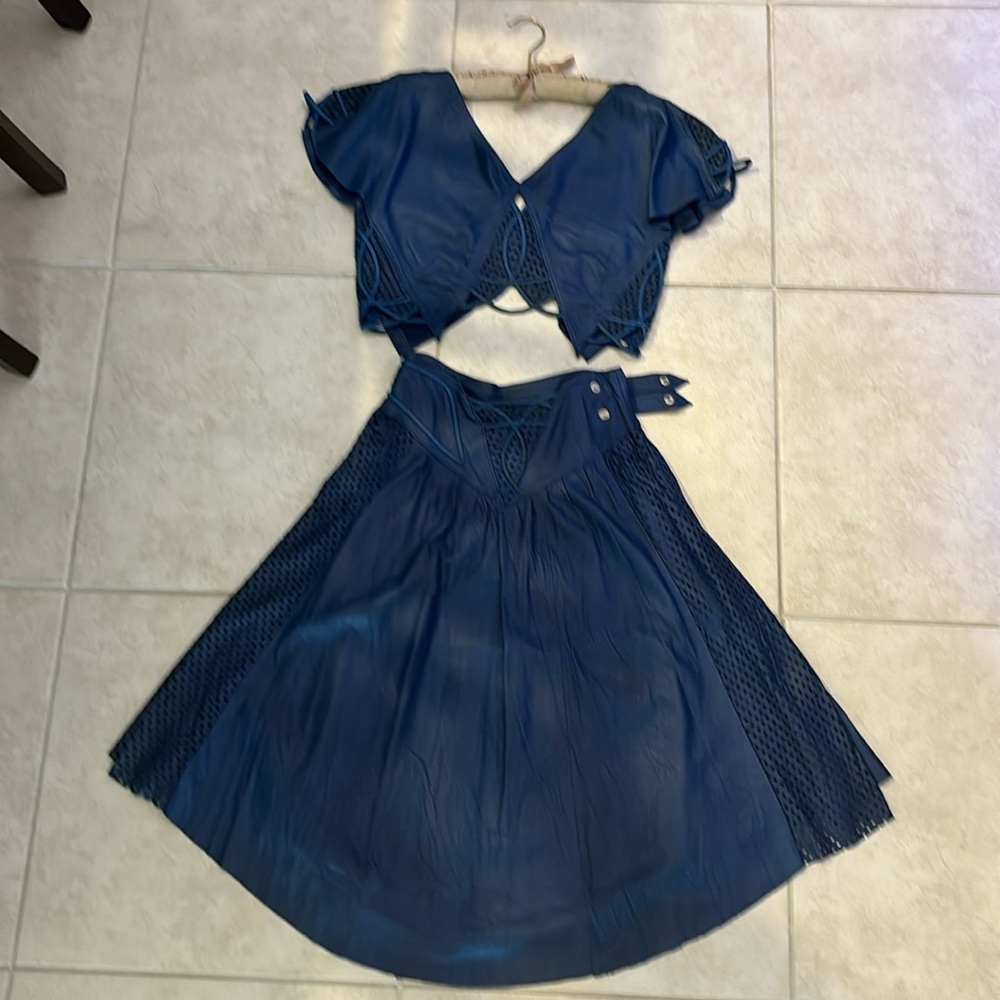 Jacques Lelong blue leather matching top and skirt.